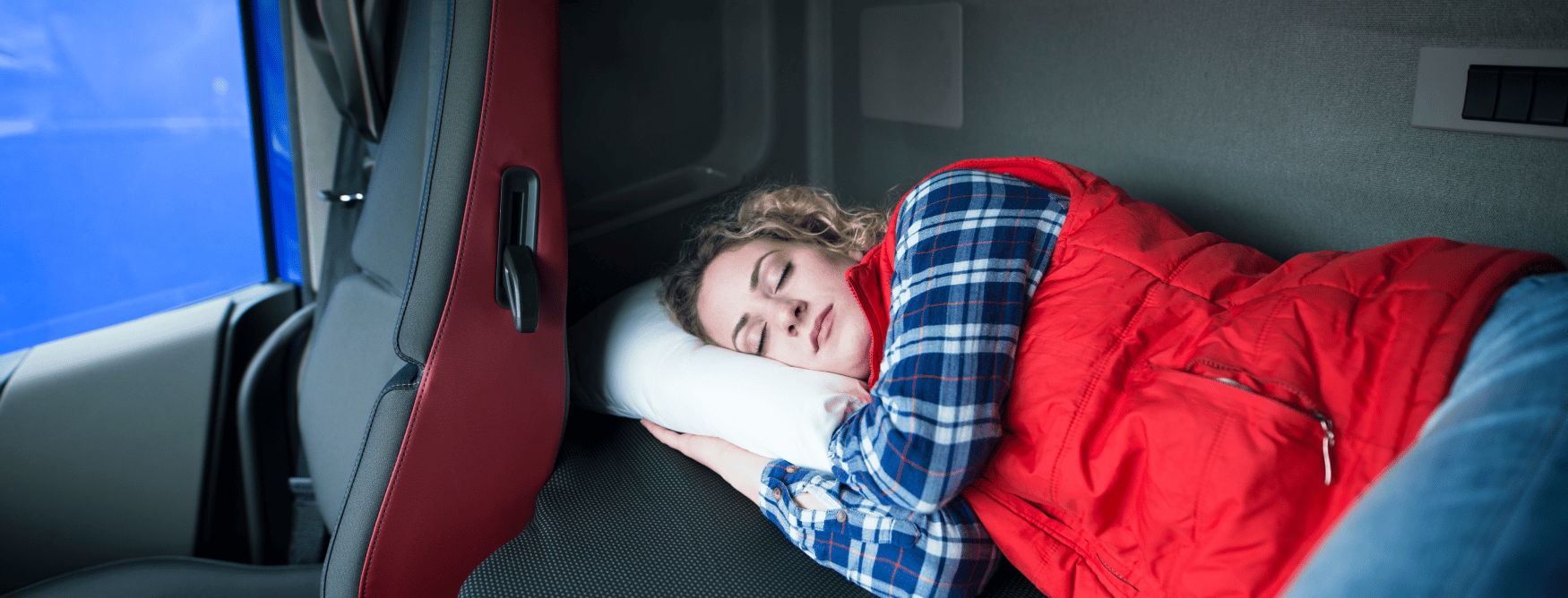 person sleeping in semi truck
