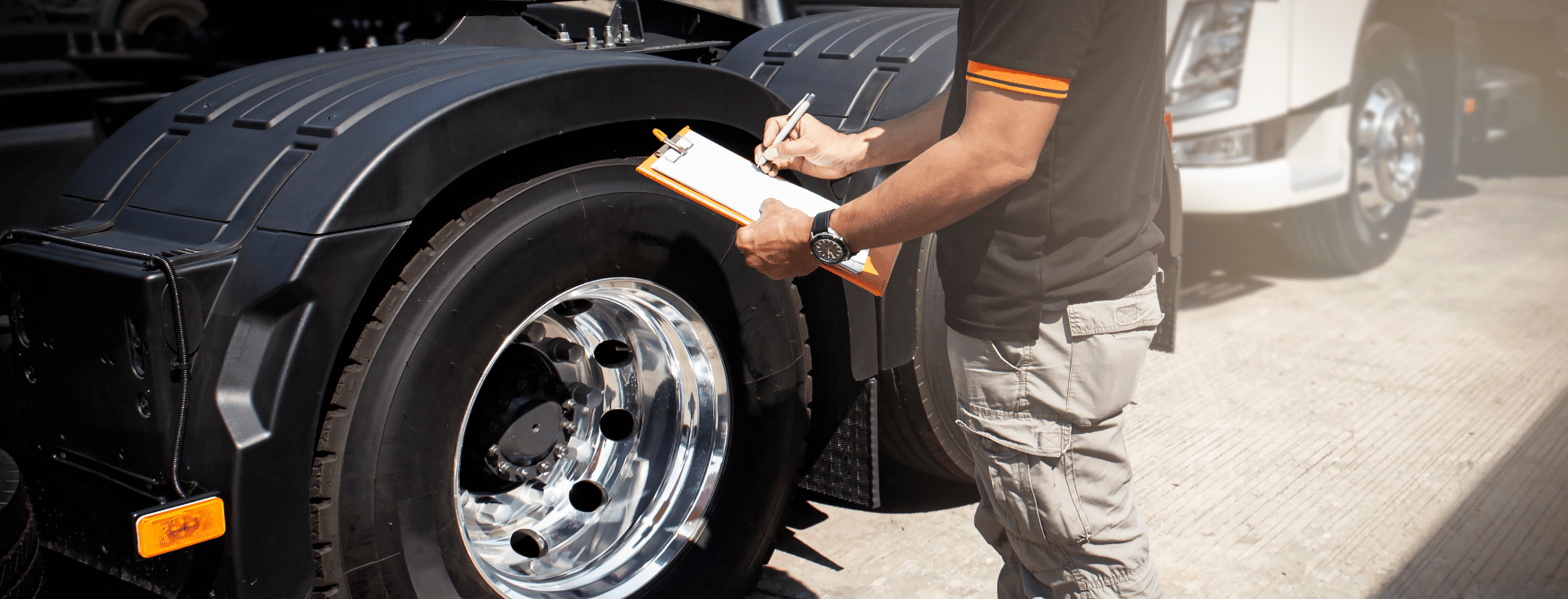 inspecting semi truck wheels