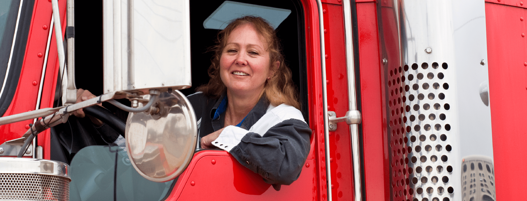 lady trucker in a truck