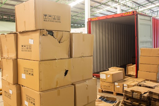 damaged freight unloading from a shipping container